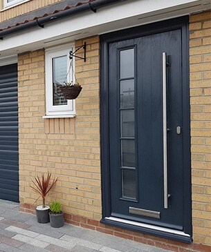 Modern grey composite door with long handle