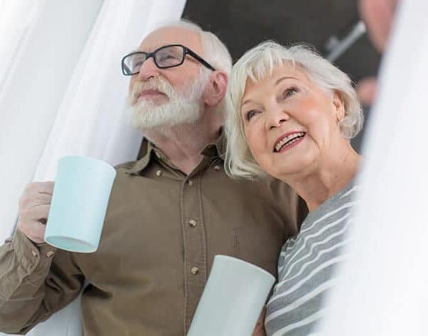older couple opening their new windows