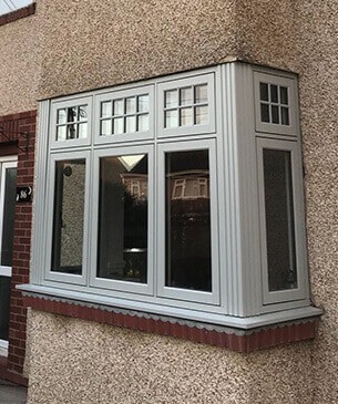 grey flush window in bay formation
